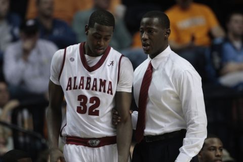 Alabama head coach Anthony Grant talks with forward Johndre Jefferson (32) in the second half of an NCAA college basketball game against South Carolina on Thursday, March 11, 2010, at the Southeastern Conference tournament in Nashville, Tenn. (AP Photo/Dave Martin)