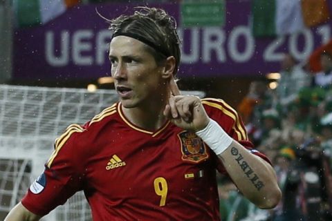 Spain's Fernando Torres celebrates after scoring a goal against Ireland during their Group C Euro 2012 soccer match at PGE Arena in Gdansk June 14, 2012.                         REUTERS/Pascal Lauener (POLAND  - Tags: SPORT SOCCER)  