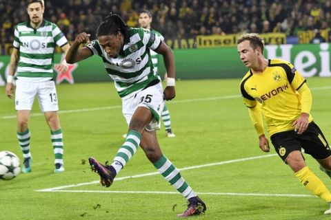 Dortmund's Mario Goetze, right, and Sporting's Ruben Semedo challenge for the ball during the Champions League group F soccer match between Borussia Dortmund and Sporting CP in Dortmund, Germany, Wednesday, Nov. 2, 2016. (AP Photo/Martin Meissner)