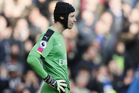Arsenal's goalkeeper Petr Cech looks on after he conceded the third goal scored by Chelsea's Cesc Fabregas during the English Premier League soccer match between Chelsea and Arsenal at Stamford Bridge stadium in London, Saturday, Feb. 4, 2017. Chelsea won the game 3-1. (AP Photo/Kirsty Wigglesworth)
