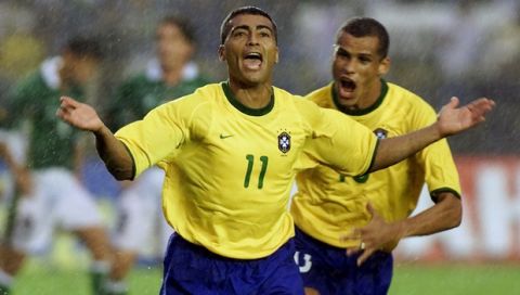 **FILE** Brazil's Romario, left, celebrates after scoring a penalty goal against Bolivia during a 2002 World Cup qualifying match at the Maracana stadium in Rio de Janeiro, in this Sunday, Sept. 3, 2000, file photo. Brazilians are already preparing the celebrations for Romario's 1,000th career goal. There will be fireworks, chanting and maybe even a trophy presentation after he scores. Brazil's Rivaldo is at the right.  (AP Photo/Eraldo Peres)