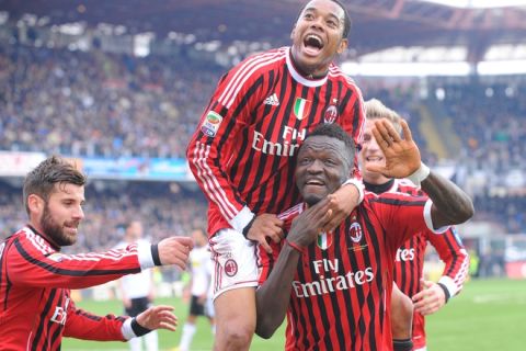 AC Milan Sulley Ali Muntari (DOWN) celebrates with teammate Brazilian Robinho after scoring against Cesena during their Serie A fooball match in Cesena on Febuary  19, 2012. AC Milan won the match 3-1.     AFP PHOTO / MAURIZIO  PARENTI (Photo credit should read MAURIZIO PARENTI/AFP/Getty Images)