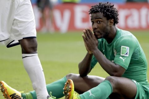 Ivory Coast's Wilfried Bony reacts after missing a chance during the group C World Cup soccer match between Colombia and Ivory Coast at the Estadio Nacional in Brasilia, Brazil, Thursday, June 19, 2014.  (AP Photo/Sergei Grits)