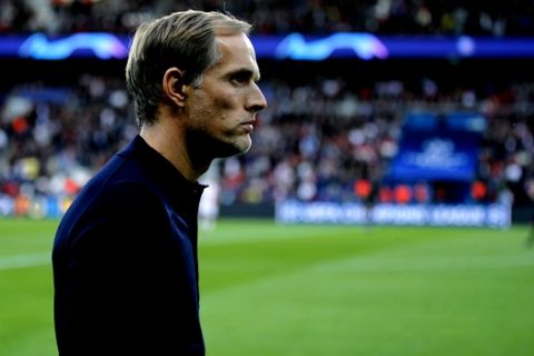 PSG coach Thomas Tuchel walks to the bench prior to the the group C Champions League soccer match between Paris Saint Germain and Red Star Belgrade at the Parc des Princes stadium in Paris, France, Wednesday, Oct. 3, 2018. (AP Photo/Francois Mori)