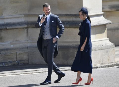 David and Victoria Beckham arrive for the wedding ceremony of Prince Harry and Meghan Markle at St. George's Chapel in Windsor Castle in Windsor, near London, England, Saturday, May 19, 2018. (Toby Melville/pool photo via AP)