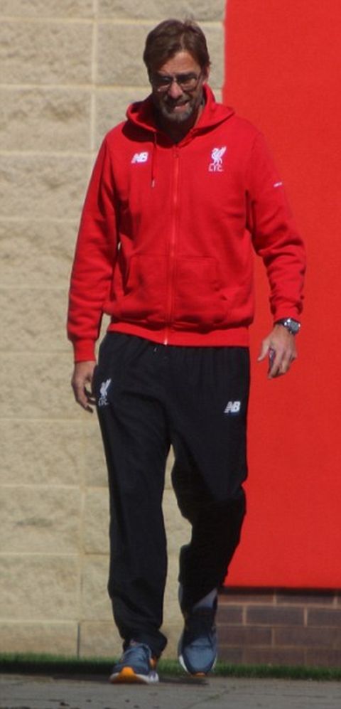 EXCLUSIVE PICS : 

 LIVERPOOL MANAGER SPOTTED AT MELWOOD TRAINING GROUND JURGEN KLOPP SPOTTED GOING BEHIND A WALL FOR A SMOKE MINUTES LATER HE RETURNED AND GOT ON THE TEAM COACH WITH THE LIVERPOOL PLAYERS WHO HAD BEEN WAITING FOR HIM.

PLEASE CONTACT keith_fairbrother@yahoo.co.uk FOR USAGE AND AGREE FEES 