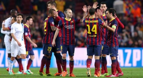 BARCELONA, SPAIN - MARCH 12:  The players of FC Barcelona celebrate after the UEFA Champions League Round of 16 match between FC Barcelona and Manchester City at Camp Nou on March 12, 2014 in Barcelona, Spain.  (Photo by Alex Livesey/Getty Images)