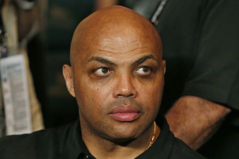 FILE - In this May 2, 2015, file photo, Charles Barkley joins the crowd before the start of the world welterweight championship bout between Floyd Mayweather Jr., and Manny Pacquiao in Las Vegas.  After LeBron James was criticized by Barkley for questioning Clevelands front office, James tore into the former NBA star and opinionated TV commentator on Monday, Jan. 30,  following a loss in Dallas. (AP Photo/John Locher, File)