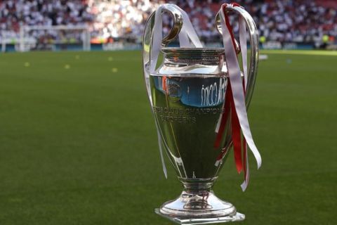 A view of the Champions League trophy, prior to the start of the Champions League final soccer match between Atletico Madrid and Real Madrid, at the Luz stadium, in Lisbon, Portugal, Saturday, May 24, 2014. (AP Photo/Francisco Seco)