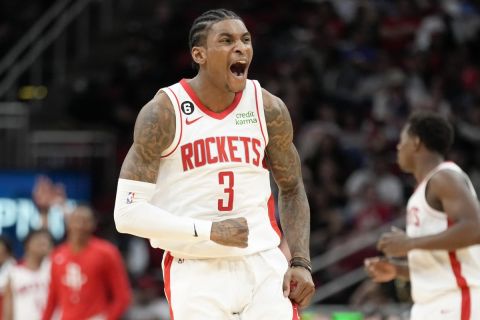 Houston Rockets guard Kevin Porter Jr. (3) reacts after making a 3-point basket during the second half of an NBA basketball game against the Chicago Bulls, Saturday, March 11, 2023, in Houston. (AP Photo/Eric Christian Smith)