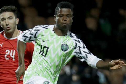 Nigeria's Mikel Ndubusi Agu during the international friendly soccer match between Serbia and Nigeria at The Hive Stadium in London, Tuesday, March 27, 2018. (AP Photo/Matt Dunham)