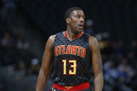 FILE--In this Jan. 25, 2016, file photo Atlanta Hawks guard Lamar Patterson stand on the court in the second half of an NBA basketball game in Denver. Australian National Basketball League Brisbane Bullets recruit Lamar Patterson was briefly detained after landing in Brisbane on Thursday, Nov. 1, 2018, with his dog, Kobe. (AP Photo/David Zalubowski, File)
