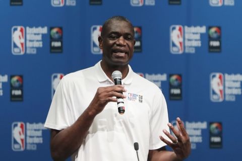 Dikembe Mutombo, NBA Global Ambassador, speaks during the opening ceremony of Basketball without Borders Africa, the NBA and FIBA's global basketball development and community outreach program, at the American International School in Johannesburg, South Africa, Wednesday, Aug. 1, 2018. (AP Photo/Themba Hadebe)