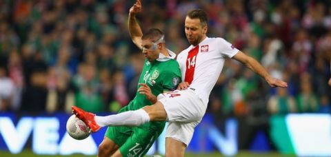 DUBLIN, IRELAND - MARCH 29:  Jonathan Walters of Republic of Ireland and Jakub Wawrzyniak of Poland battle for the ball during the EURO 2016 Qualifier match between Republic of Ireland and Poland at Aviva Stadium on March 29, 2015 in Dublin, Ireland.  (Photo by Ian Walton/Getty Images)