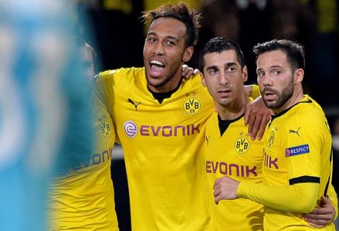 DORTMUND, GERMANY - NOVEMBER 05:  (L-R) Pierre-Emerick Aubameyang celebrates with team mates Henrikh Mkhitaryan and Gonzalo Castro of Dortmund after scoring his team's second goal during the UEFA Europa League group stage match between Borussia Dortmund and Qabala FK at Signal Iduna Park on November 5, 2015 in Dortmund, Germany.  (Photo by Sascha Steinbach/Bongarts/Getty Images)