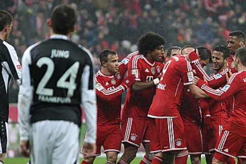 MUNICH, GERMANY - FEBRUARY 02:  Players of Bayern Muenchen celebrate their third goal during the Bundesliga match between FC Bayern Muenchen and Eintracht Frankfurt at Allianz Arena on February 2, 2014 in Munich, Germany.  (Photo by Alexandra Beier/Bongarts/Getty Images)