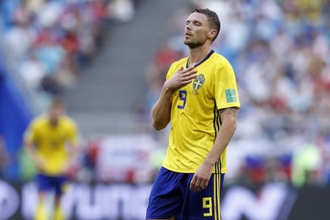 Sweden's Marcus Berg reacts after missing a scoring chance during the quarterfinal match between Sweden and England at the 2018 soccer World Cup in the Samara Arena, in Samara, Russia, Saturday, July 7, 2018. (AP Photo/Alastair Grant)