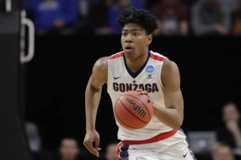 Gonzaga forward Rui Hachimura moves the ball against UNC-Greensboro during an NCAA men's college basketball tournament first-round game, Thursday, March 15, 2018, in Boise, Idaho. (AP Photo/Ted S. Warren)