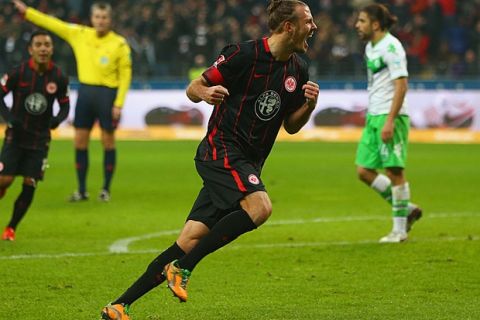 FRANKFURT AM MAIN, GERMANY - JANUARY 24:  Alexander Meier of Eintracht Frankfurt celebrates as he scores their second goal during the Bundesliga match between Eintracht Frankfurt and VfL Wolfsburg at Commerzbank-Arena on January 24, 2016 in Frankfurt am Main, Germany.  (Photo by Alex Grimm/Bongarts/Getty Images)