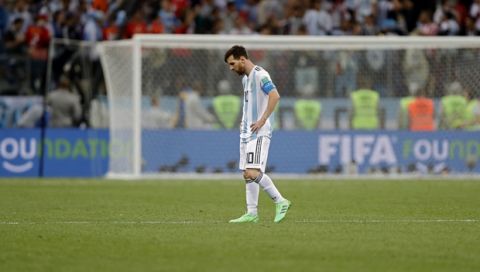 Argentina's Lionel Messi walks along the pitch at the end of the group D match between Argentina and Croatia at the 2018 soccer World Cup in Nizhny Novgorod Stadium in Nizhny Novgorod, Russia, Thursday, June 21, 2018. Croatia defeated Argentina 3-0. (AP Photo/Ricardo Mazalan)