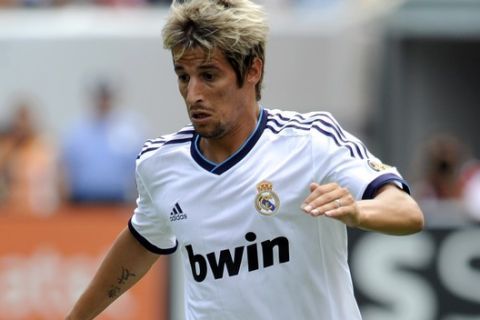 Real Madrid's Fabio Coentrao is shown with the ball during a soccer game against Glasgow Celtic Saturday, Aug. 11, 2012, in Philadelphia. Real Mardrid won, 2-0. (AP Photo/Michael Perez)