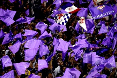 Fiorentina fans wave flags prior to the start of Italian Cup final match between Fiorentina and Napoli in Rome's Olympic stadium Saturday, May 3, 2014. (AP Photo/Gregorio Borgia, Pool)