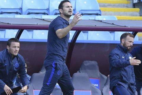 Chelsea's head coach Frank Lampard reacts during the English Premier League soccer match between Aston Villa and Chelsea at the Villa Park stadium in Birmingham, England, Sunday, June 21, 2020. (Justin Tallis/Pool via AP)