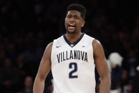 Villanova's Kris Jenkins (2) reacts after making a three point basket during the first half of a championship NCAA college basketball game against Creighton in the finals of the Big East men's tournament Saturday, March 11, 2017, in New York. (AP Photo/Frank Franklin II)