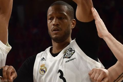 Moscow's Kyle Hines, looks to layup as Madrid's Rudy Fernandez, left, Walter Tavares, center right, and Anthony Randolph, second right, try and block during the Euroleague Final Four semifinal basketball match between CSKA Moscow and Real Madrid at the Fernando Buesa Arena in Vitoria, Spain, Friday, May 17, 2019. (AP Photo/Alvaro Barrientos)