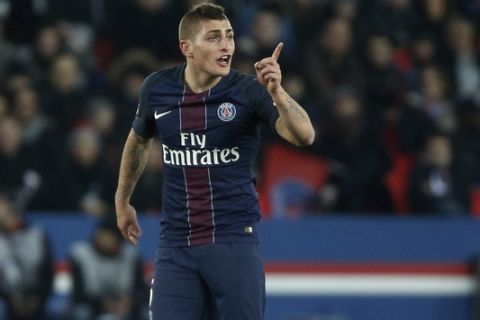 FILE - In this Sunday, Dec. 11, 2016 file photo, PSG's Marco Verratti gestures during the League One soccer match against Nice, at the Parc des Princes stadium, in Paris, France. Verratti was given a seemingly unusual yellow card for anti-sporting behavior known in the game as trickery when he knelt down and headed the ball back to his goalkeeper during a French league match against Nantes on Saturday, Jan. 21, 2017. (AP Photo/Thibault Camus, File)