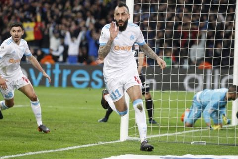 Marseille's Konstantinos Mitroglou, celebrates after his goal during the League One soccer match between Marseille and Lyon at the Velodrome stadium, in marseille, southern France , Sunday, March 18, 2018. (AP Photo/Claude Paris)