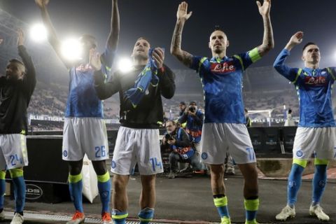 Napoli players thank their supporters at the end of a Champions League, group C soccer match between Napoli and Paris Saint Germain, at the San Paolo stadium in Naples, Italy, Tuesday, Nov. 6, 2018. The match ended in a 1 - 1 tie. (AP Photo/Andrew Medichini)