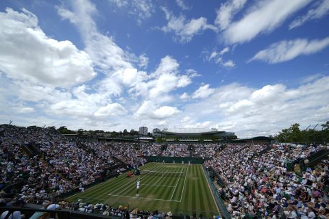 General view of Court 2 as Christopher Eubanks of the US serves to Stefanos Tsitsipas of Greece in a men's singles match on day eight of the Wimbledon tennis championships in London, Monday, July 10, 2023. (AP Photo/Alastair Grant)
