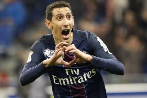 FILE - In this April 1, 2017, file photo, Paris Saint Germain's Angel Di Maria celebrates after he scored a goal against Monaco during their League Cup final soccer match in Decines, France. A French official says police investigating suspected tax fraud linked to the soccer industry have raided the headquarters of Paris Saint-Germain and the homes of three Argentine players in France. The official said anti-corruption police units searched the homes of PSG players Angel Di Maria and Javier Pastore, and that of Nantes forward Emiliano Sala on Tuesday, May 23, 2017. (AP Photo/Laurent Cipriani, File)