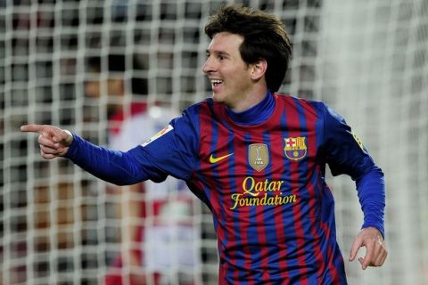 Barcelona's Argentinian forward Lionel Messi celebrates his goal during the Spanish league football match FC Barcelona vs Granada CF on March 20, 2012 at the Camp Nou stadium in Barcelona. AFP PHOTO/ JOSEP LAGO        (Photo credit should read JOSEP LAGO/AFP/GettyImages)