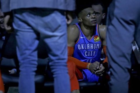 Oklahoma City Thunder's Russell Westbrook sits on the bench during a timeout during the second half of an NBA basketball game against the Milwaukee Bucks Wednesday, April 10, 2019, in Milwaukee. (AP Photo/Aaron Gash)