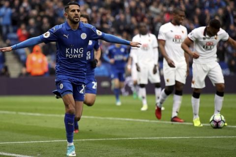 Leicester City's Riyad Mahrez celebrates scoring his side's second goal of the game during the English Premier League soccer match Leicester City against Watford at the King Power Stadium, Leicester, England, Saturday May 6, 2017. (Nick Potts/PA via AP)
