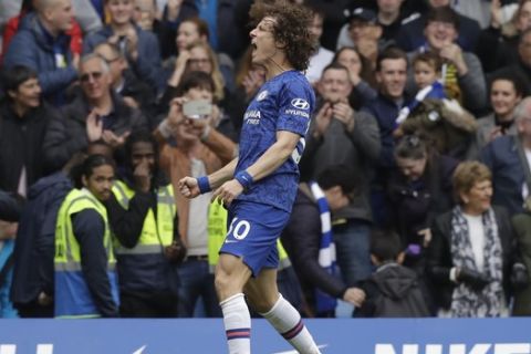 Chelsea's David Luiz celebrates after scoring his side's second goal during the English Premier League soccer match between Chelsea and Watford at Stamford Bridge stadium in London, Sunday, May 5, 2019. (AP Photo/Matt Dunham)