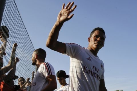 AC Milan forward Carlos Bacca waves to supporters during a training at the Milanello sport center, in Carnago, Italy, Wednesday, July 5, 2017. (AP Photo/Luca Bruno)