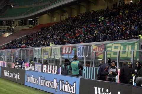 Young fans sit in the stands prior to the Serie A soccer match between Inter Milan and Sassuolo, at the San Siro stadium in Milan, Italy, Saturday, Jan. 19, 2019. (AP Photo/Luca Bruno)