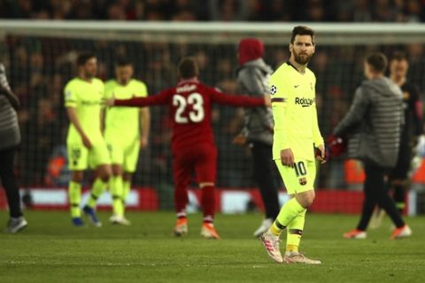 Barcelona's Lionel Messi leaves the playing field after losing the Champions League semifinal, second leg, soccer match against Liverpool at the Anfield stadium in Liverpool, England, Tuesday, May 7, 2019. (AP Photo/Dave Thompson)