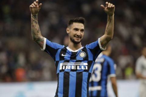 Inter Milan's Matteo Politano gestures during a Serie A soccer match between Inter Milan and Lecce at the San Siro stadium, in Milan, Italy, Monday, Aug. 26, 2019. (AP Photo/Luca Bruno)