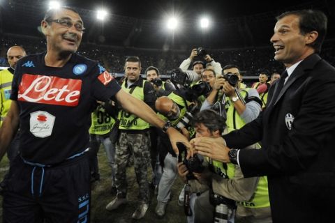 Napoli coach Maurizio Sarri greets Juventus coach Massimiliano Allegri during a Serie A soccer match between Napoli and Juventus, at the San Paolo stadium in Naples, Italy, Saturday, Sept. 26, 2015. (AP Photo/Salvatore Laporta)