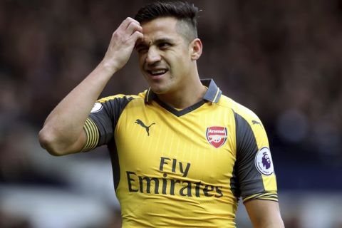 Arsenal's Alexis Sanchez gestures, during the English Premier League soccer match between West Bromwich Albion and Arsenal,  at The Hawthorns, in West Bromwich, England, Saturday March 18, 2017.  (Nick Potts/PA via AP)