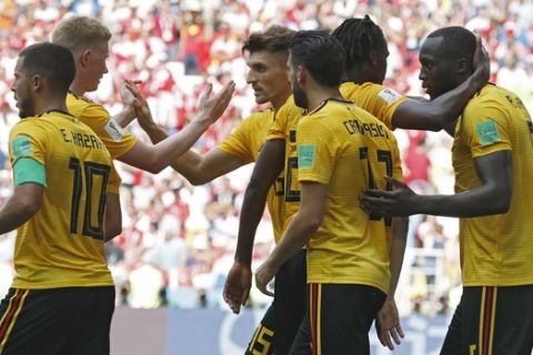 Belgium players celebrate after teammate Romelu Lukaku, right, scored their team's third goal during the group G match between Belgium and Tunisia at the 2018 soccer World Cup in the Spartak Stadium in Moscow, Russia, Saturday, June 23, 2018. (AP Photo/Antonio Calanni)
