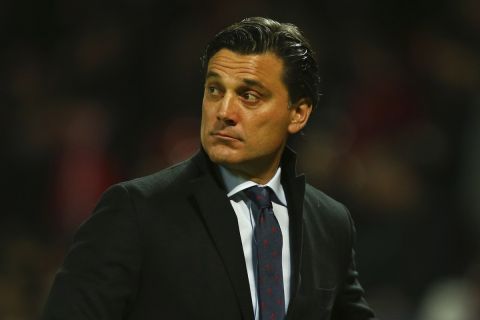 Sevilla's head coach Vicenzo Montella waits for the start of the Champions League round of 16 second leg soccer match between Manchester United and Sevilla, at Old Trafford in Manchester, England, Tuesday, March 13, 2018. (AP Photo/Dave Thompson)