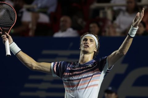 Germany's Alexander Zverev gestures to the crowd as he expresses frustration with calls during his second round match against Tommy Paul of the U.S. at the Mexican Tennis Open in Acapulco, Mexico, Wednesday, Feb. 26, 2020.(AP Photo/Rebecca Blackwell)
