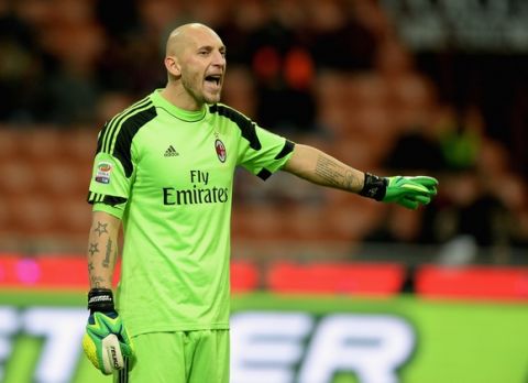 MILAN, ITALY - NOVEMBER 23:  Christian Abbiati of AC Milan reacts during the Serie A match between AC Milan and Genoa CFC at Stadio Giuseppe Meazza on November 23, 2013 in Milan, Italy.  (Photo by Claudio Villa/Getty Images)