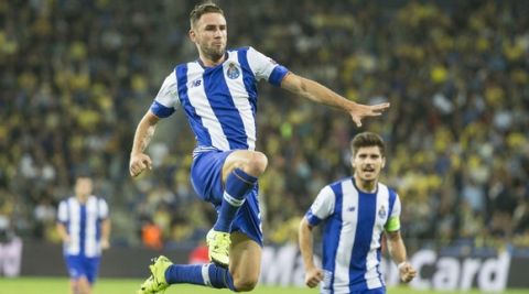Porto's Mexican defender Miguel Layun reacts after scoring during the UEFA Champions League, group G, football match between Maccabi Tel Aviv and FC Porto at the Sammy Ofer Stadium, in the Israeli coastal city of Haifa, on November 4, 2015. AFP PHOTO / JACK GUEZ        (Photo credit should read JACK GUEZ/AFP/Getty Images)