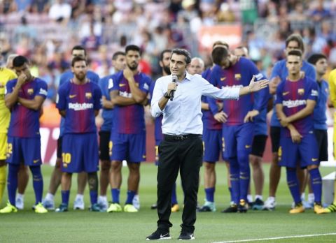FC Barcelona's coach Ernesto Valverde speaks prior of the Joan Gamper trophy friendly soccer match between FC Barcelona and Chapecoense at the Camp Nou stadium in Barcelona, Spain, Monday, Aug. 7, 2017. (AP Photo/Manu Fernandez)